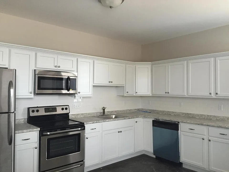 Open floor plan between kitchen and living room make your ap