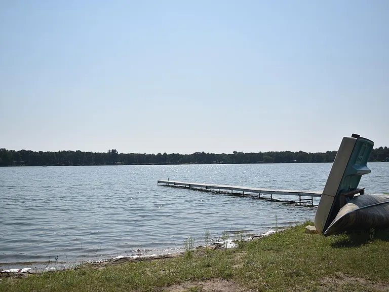 Fox Lake with dock and boats (kayak, row boat, canoe, and paddle boat)