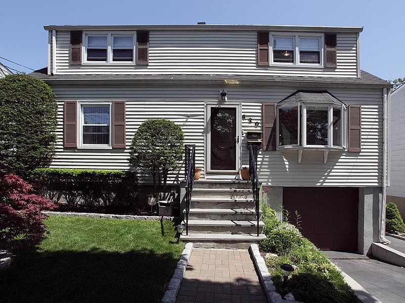 Beautifully Maintained Two-Family Home