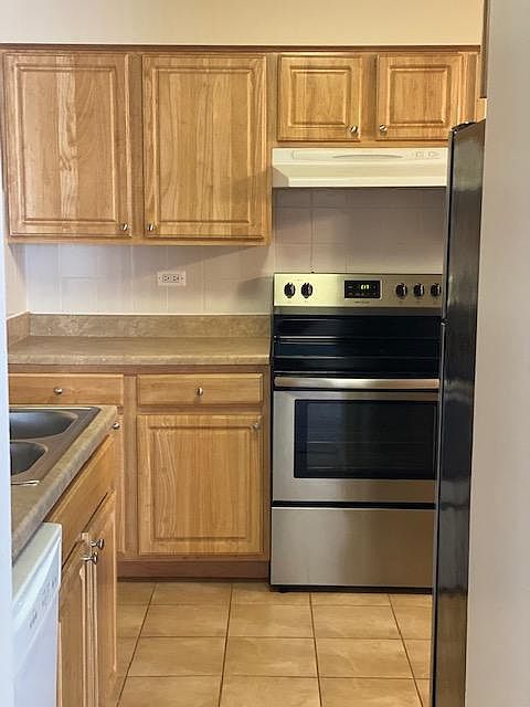 Kitchen with stainless appliances with lots of storage