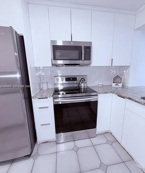 871 NE 207th Ter #4-102 — Photo 23