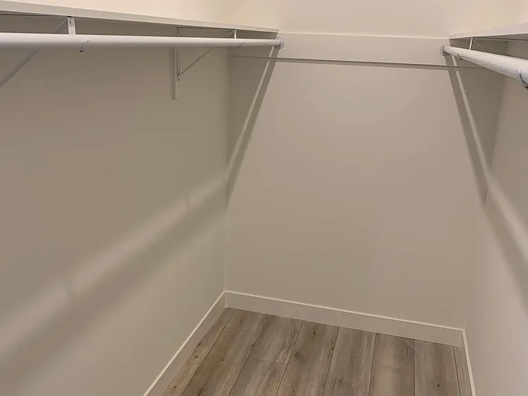 primary bedroom walk-in closet