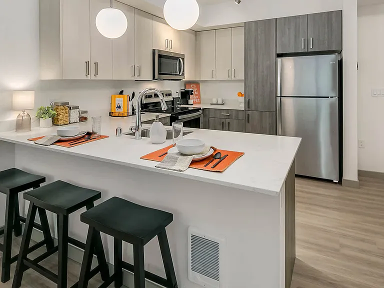 Kitchen with Stainless Steel Appliances and Quartz Countertops