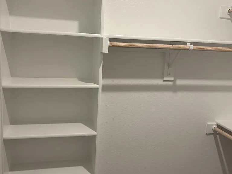 Spacious his & her closet area