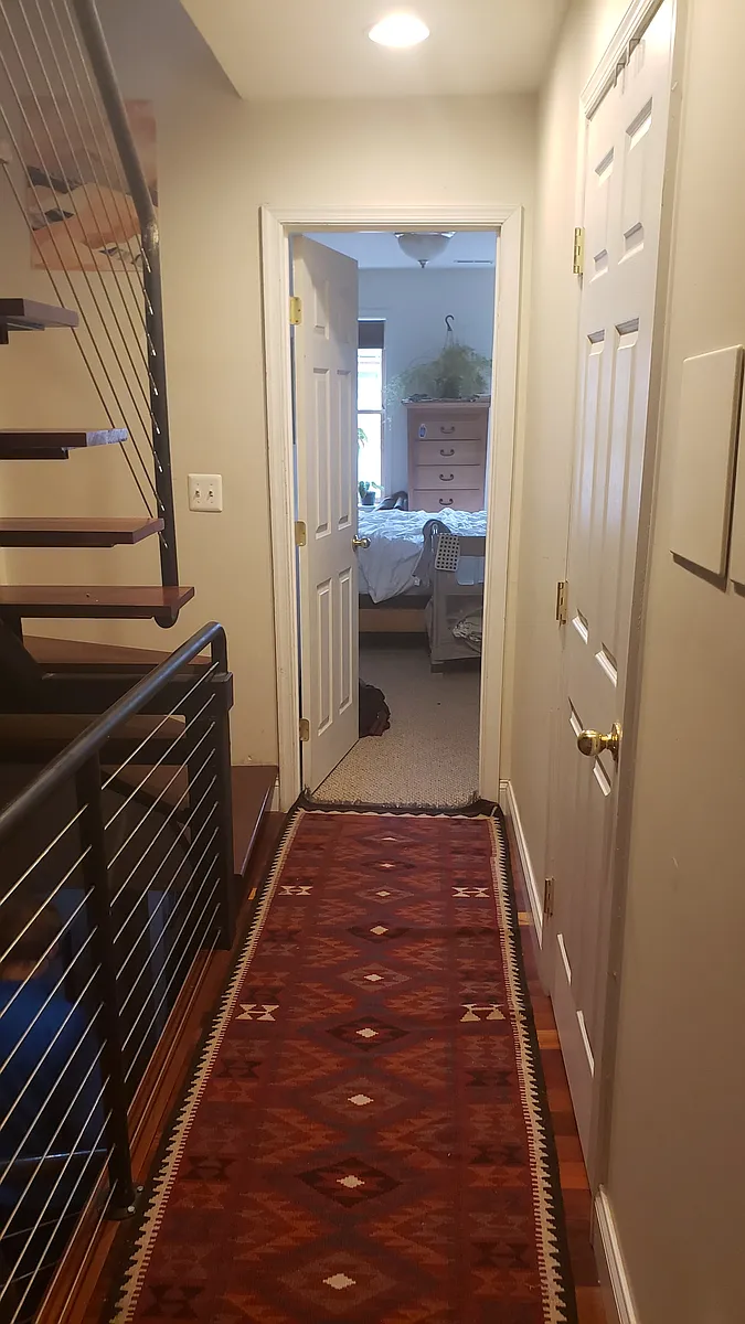 Second Floor hallway looking towards the front bedroom entry - 2427 Foster Ave
