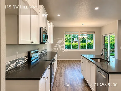 145 NW Hill Way Photo 1
