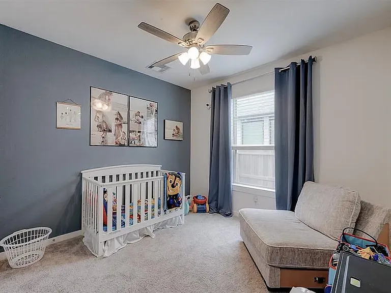 Second downstairs bedroom. Perfect for a little one!
