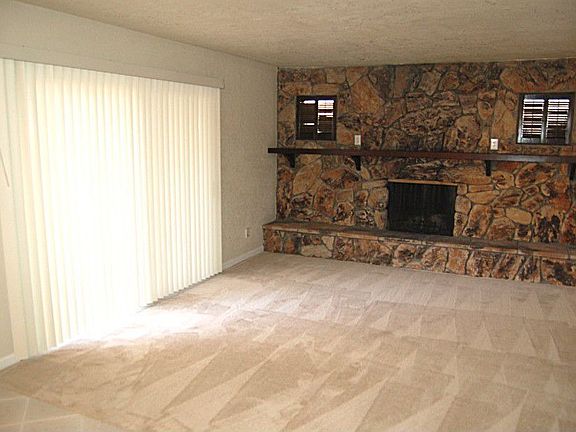 Family Room with wall-to-wall Rock Fireplace