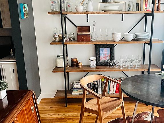 Dining room with built in open shelving up