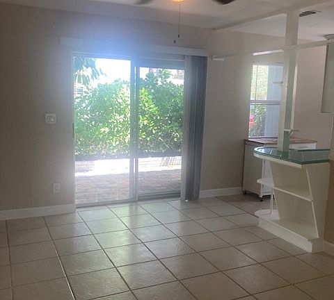 Living room area with porch area outside