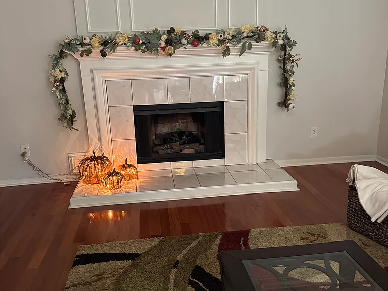 Family room with hardwood floor and fireplace