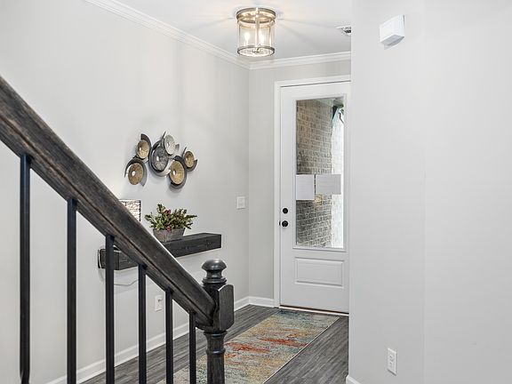 Beautiful entry Photo is a representation of home.