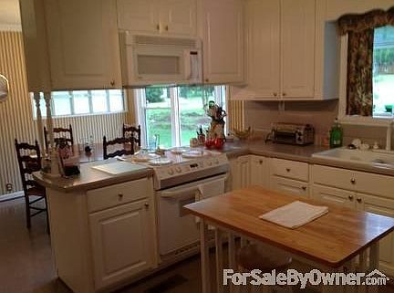 Master Bath
						:
						Newly updated/tiled Master bath. To left is large tiled shower.
