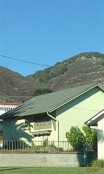 View of Two Car Garage. Many of the homeowners have remodeled existing garages into larger master suites or bumped out original master suites to make a large private bath. Also may be able to go up on the main part of the home. Must check with City of Pismo planning dept.