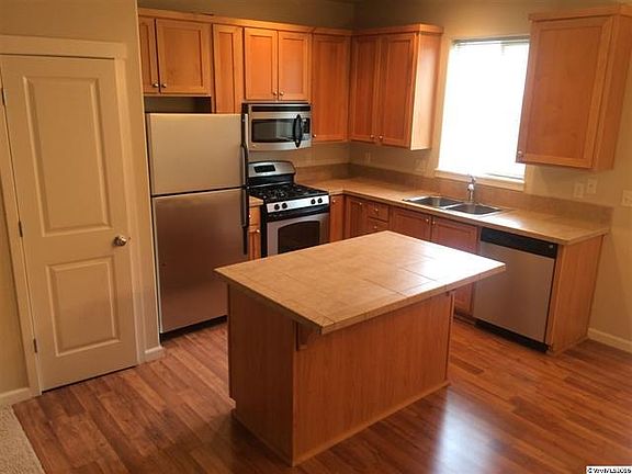 pantry, gas stove,garbage disposal,DW,micro refigerator, tile counter tops