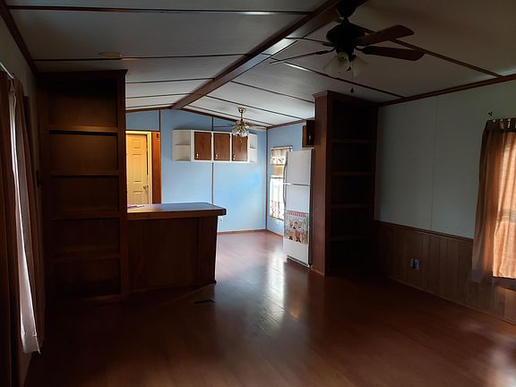 Living room, dining area and kitchen