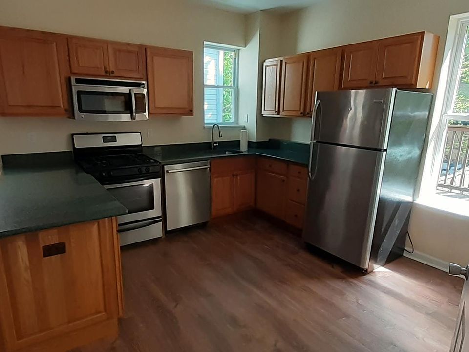 view of kitchen upon entry into 2nd floor, quartz counters