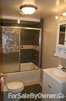 Bathroom : Complete remodel, ceramic tile surround/flooring , Delta faucets nickel finish.
