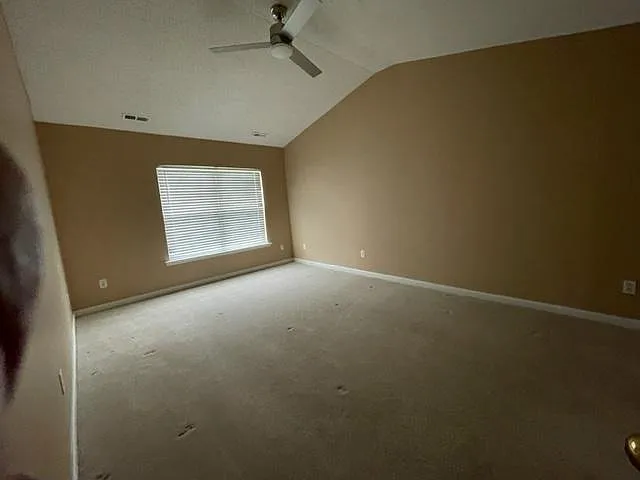 Owner's Bedroom with ceiling fan.