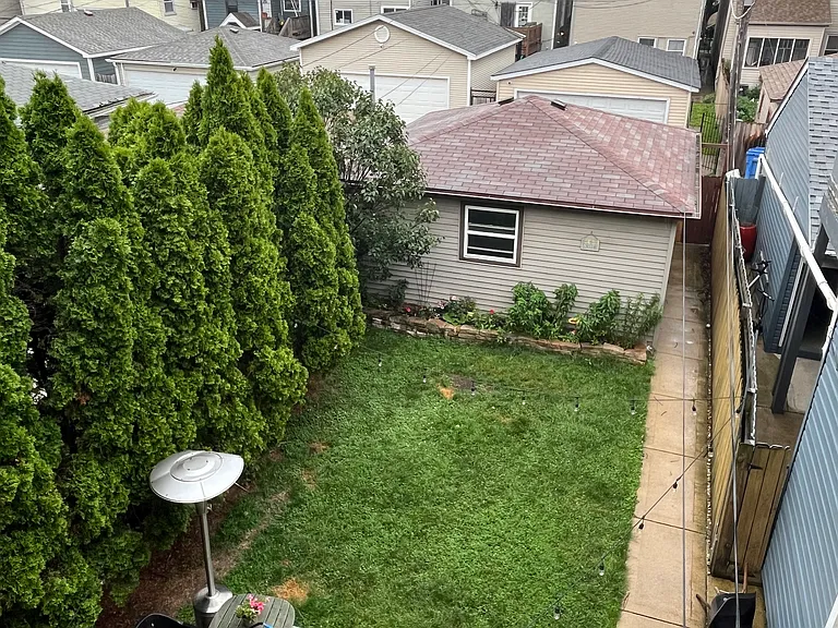 Backyard view from the 2nd floor balcony deck.