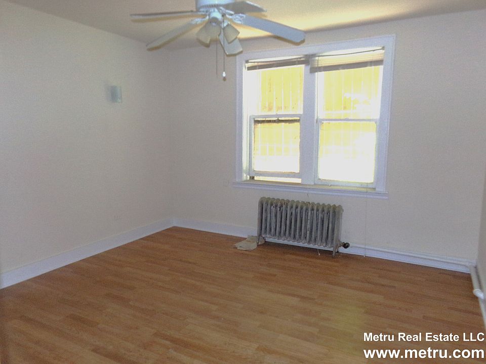 1st image of 6916 N Lakewood Ave #104