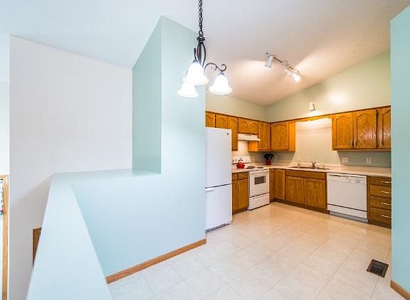 When dining table is situated in the dining area, there is additional room in the kitchen for shelves or a storage cart.