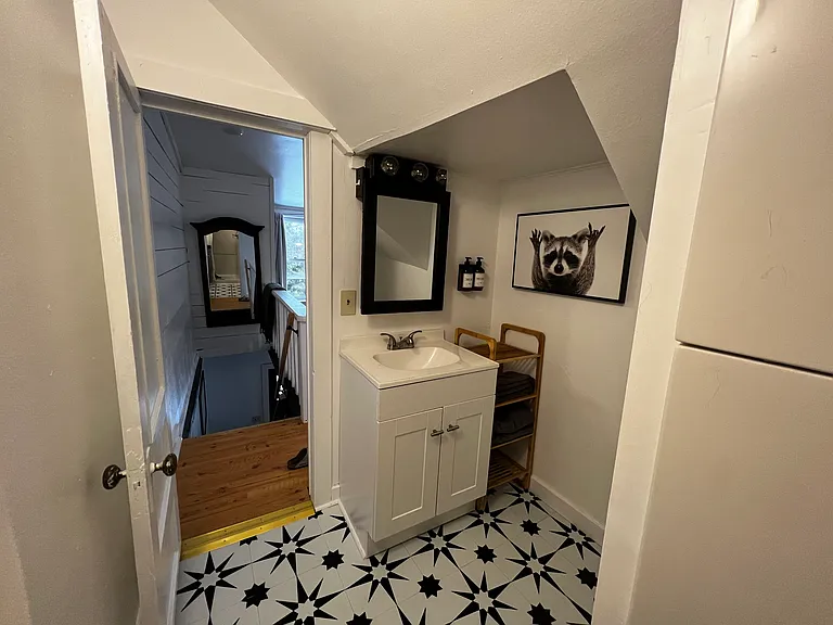 Bathroom looking out towards stairs