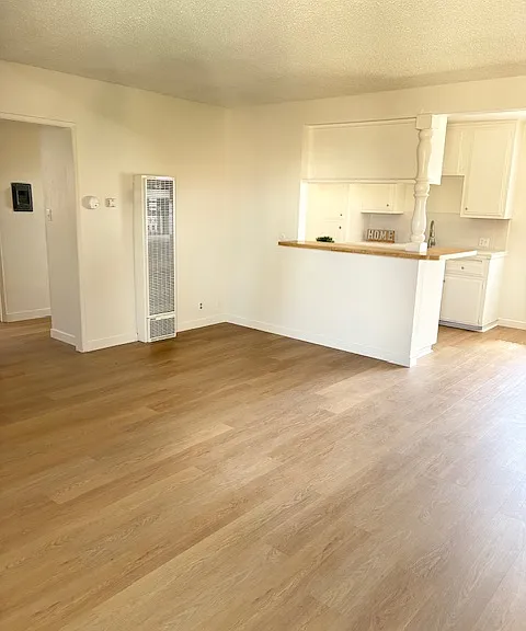 Brand new modern flooring makes the apartment feel very clean and spacious.