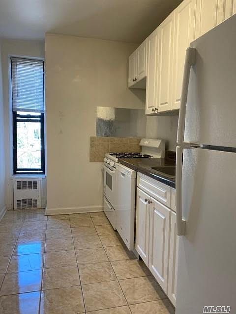 1st image of 99-63 66th Ave #D4