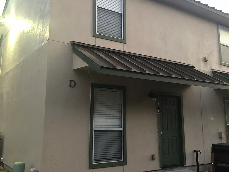 End unit upstairs and down. 500 sq feet down 400 sq feet up so only neighbor on one side