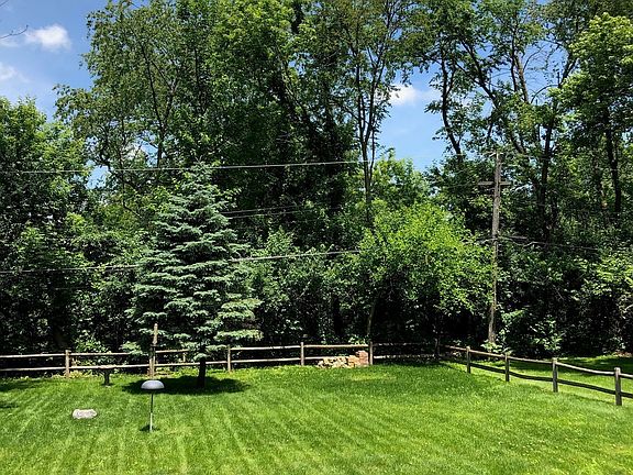 Gorgeous view of backyard from large deck, perfect for your outdoor enjoyment~Plenty of space to add