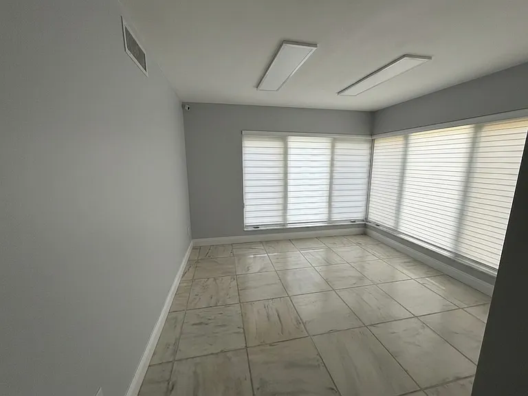 Bright Room (large windows, tile floor, LED panels)
Generous bonus room/3rd bedroom bathed in natural light with large picture windows and modern LED lighting _ perfect as a home office, guest room, or flex space