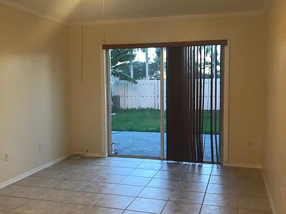 Living room with slider to back yard