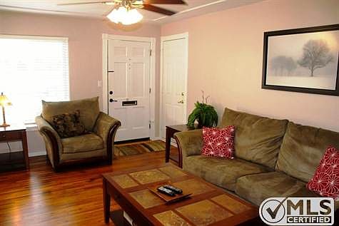 Original hardwood floors nicely maintained.... open feeling to home makes it feel larger.