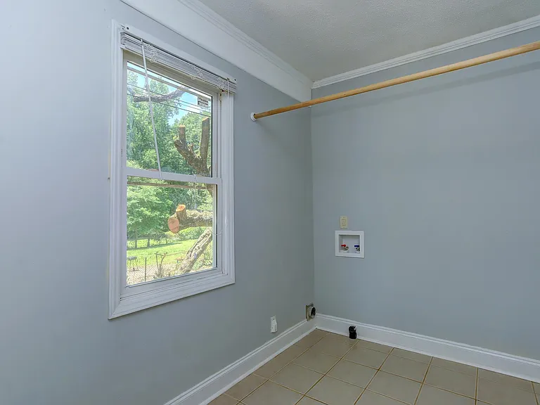 Laundry and mixed use room: play room, office, crafts, hobby, storage, and more.