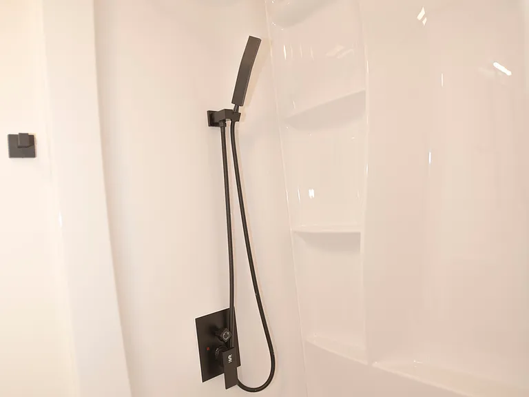 Tub with rain shower head