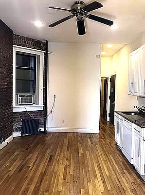 3rd image of 248 E 3rd St APT 1
