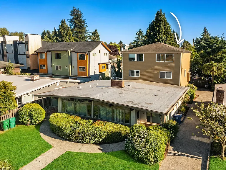 Townhouse has windows on south, west and north sides which bathe the interior in natural light.