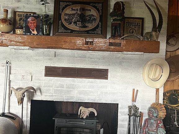 decorative fireplace with heat insert. Lots of charm and history of the old west