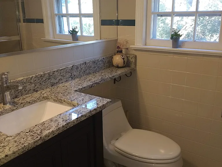Upstairs bathroom with bathtub/shower. (Window has been replaced with a new Andersen unit.)