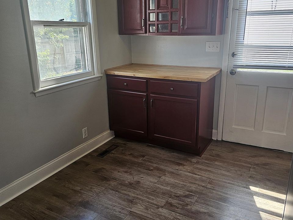 Left view of kitchen area and back door.