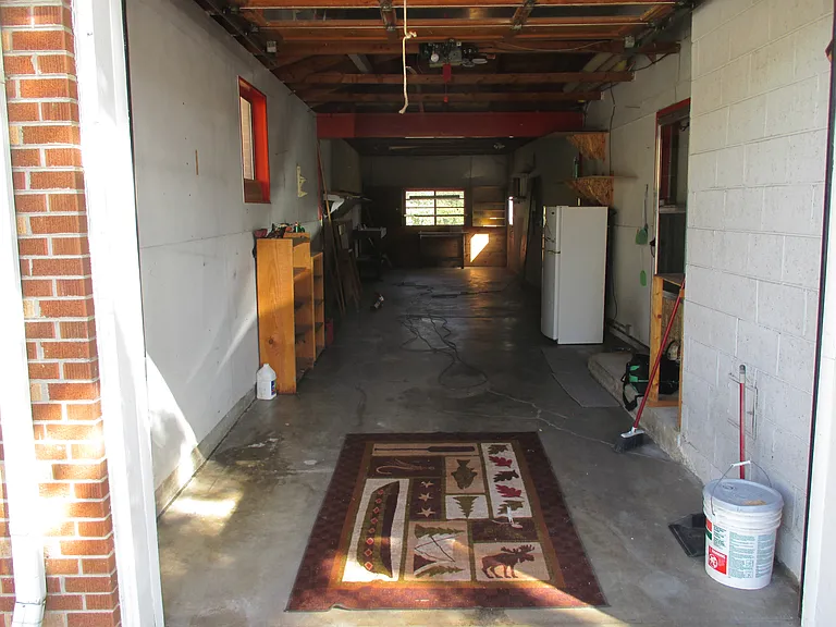 3 car tandem garage/shop! Plus 4 to 6 more off street parking spots!