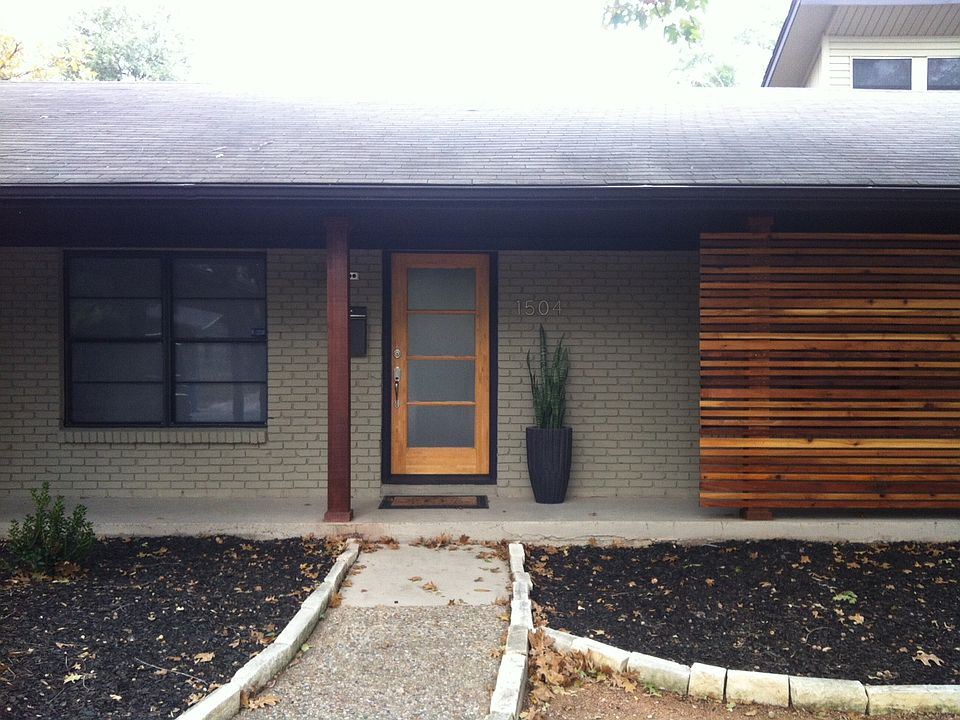 Front with wood screen porch
