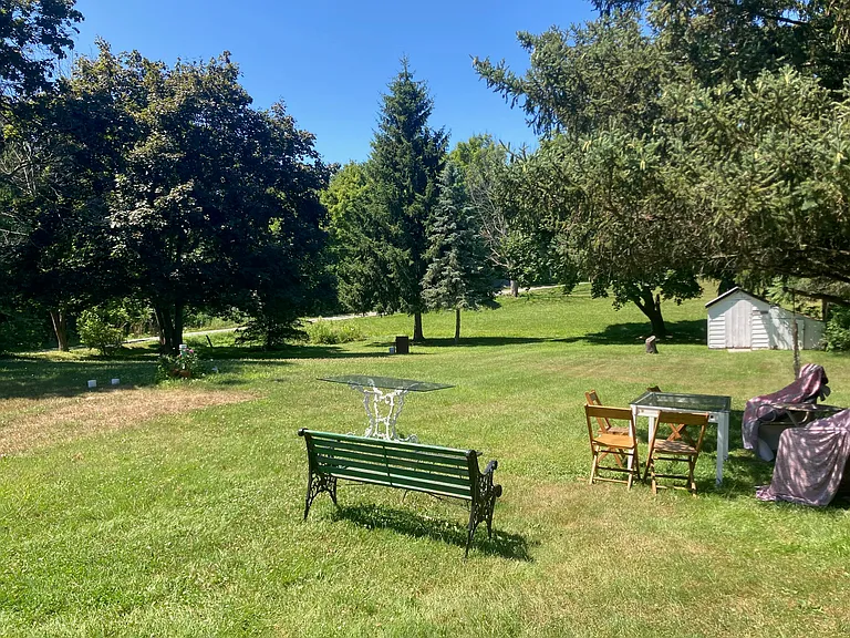 Spacious backyard 7 minute walk to Lake Ontario. Porter on the Lake side entrance is to the left of the backyard