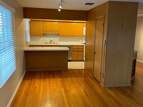 Large living room looking back at Kitchen area.