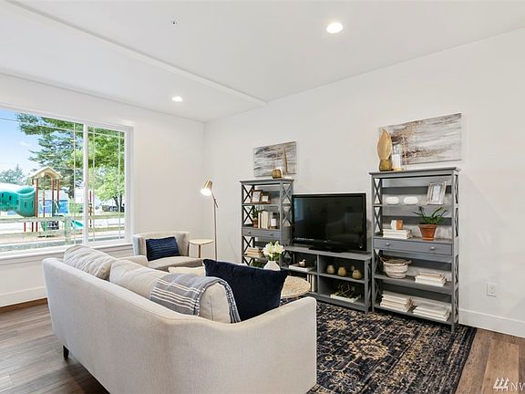 We have staged our living room. We wish to show you how your furniture may fit into your new unit.