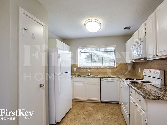 5th image of 7774 High Village Dr