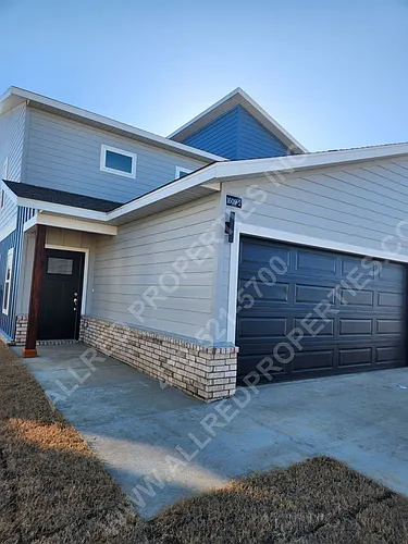 1609 SW Casuarina Dr Photo 1