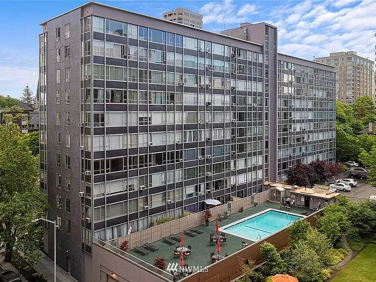 The back of the building and the pool.