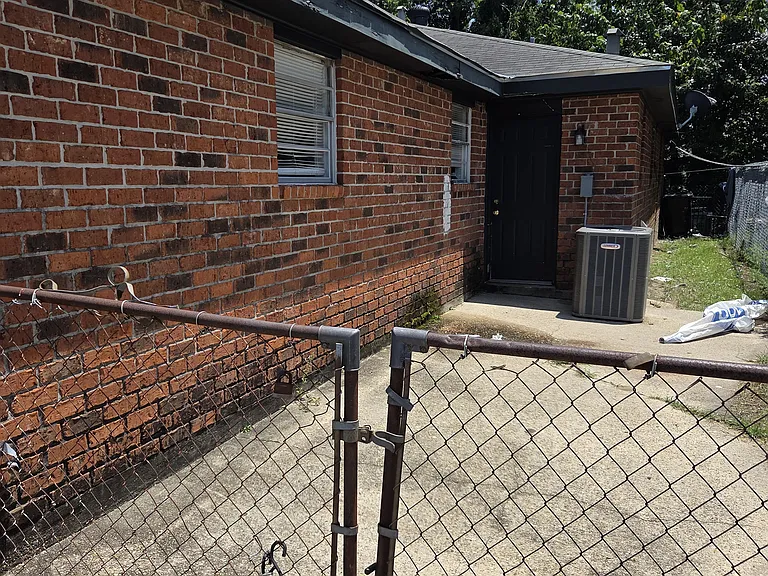 Side Yard and Entrance Drive Way